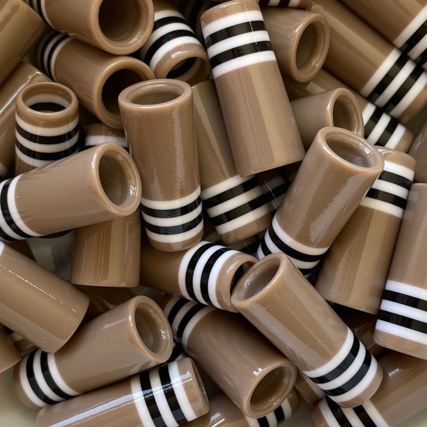 beige, white, and black custom golf ferrules