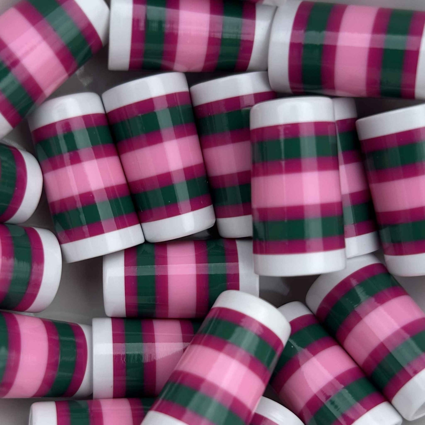 Pink and green striped golf ferrules.