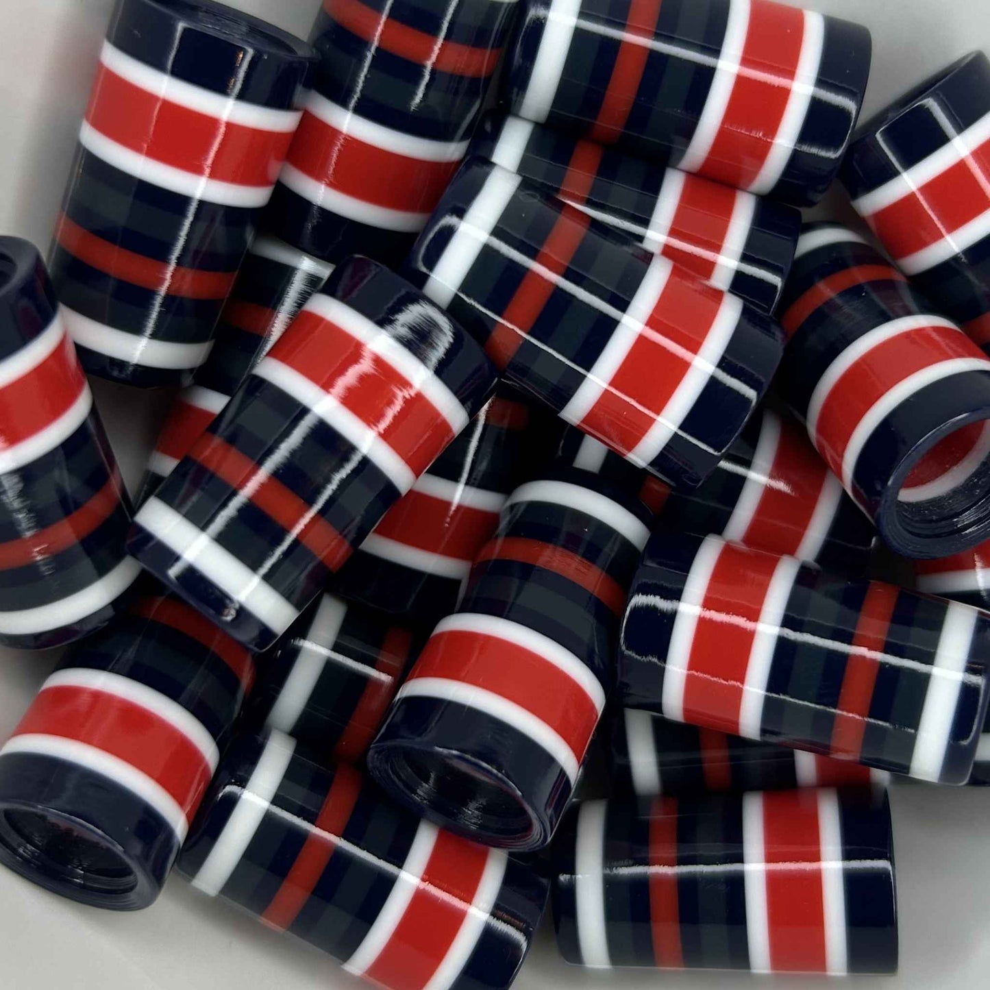 red, white, navy blue, and gray blue golf ferrules