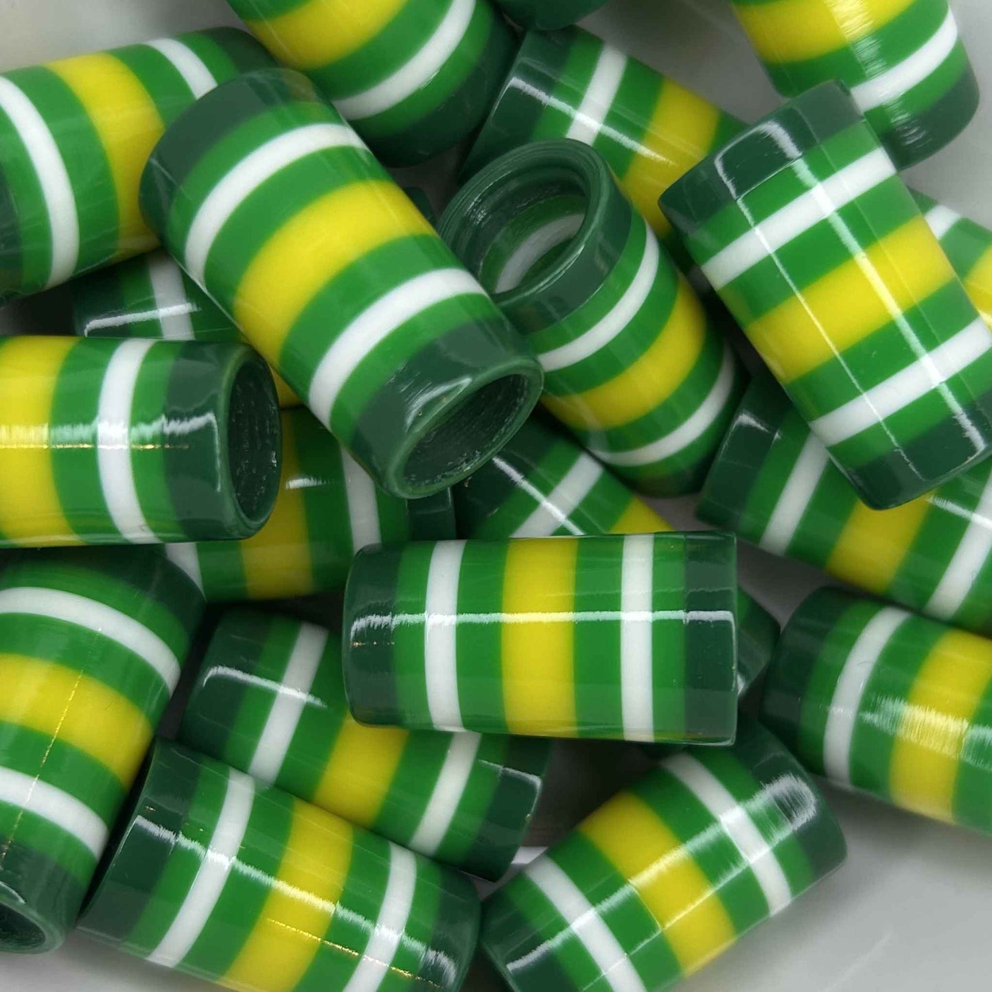green, yellow, and white 3D-printed custom golf ferrules