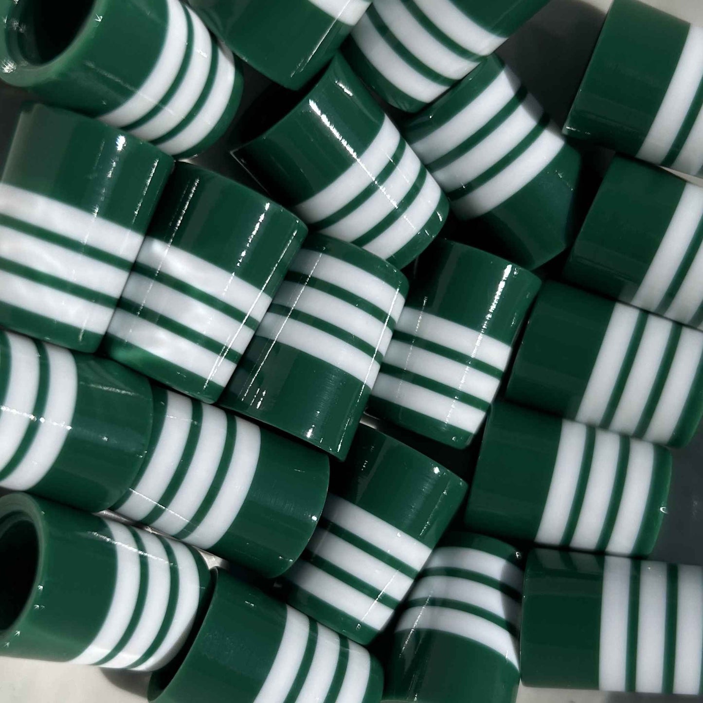 green and white golf ferrules