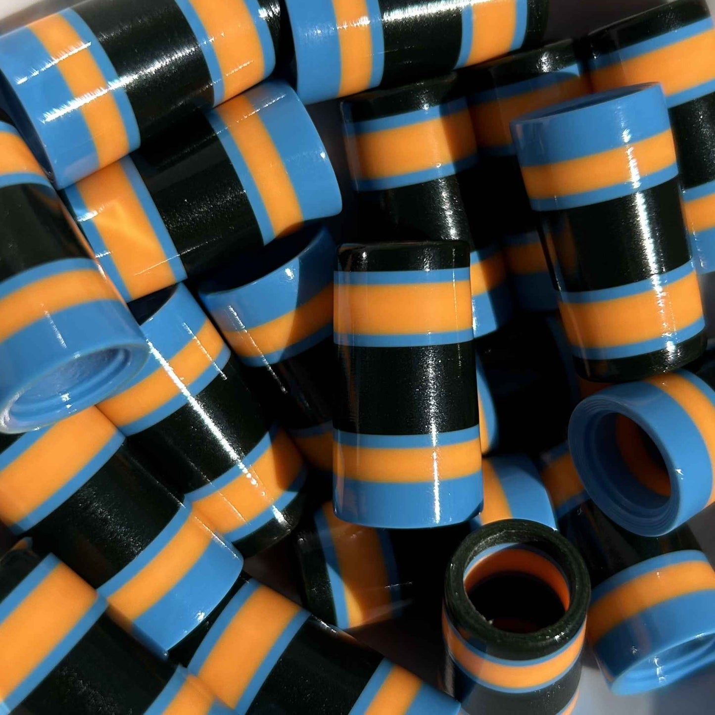 blue, orange, and deep metallic green, thick-striped 3D-printed golf ferrules