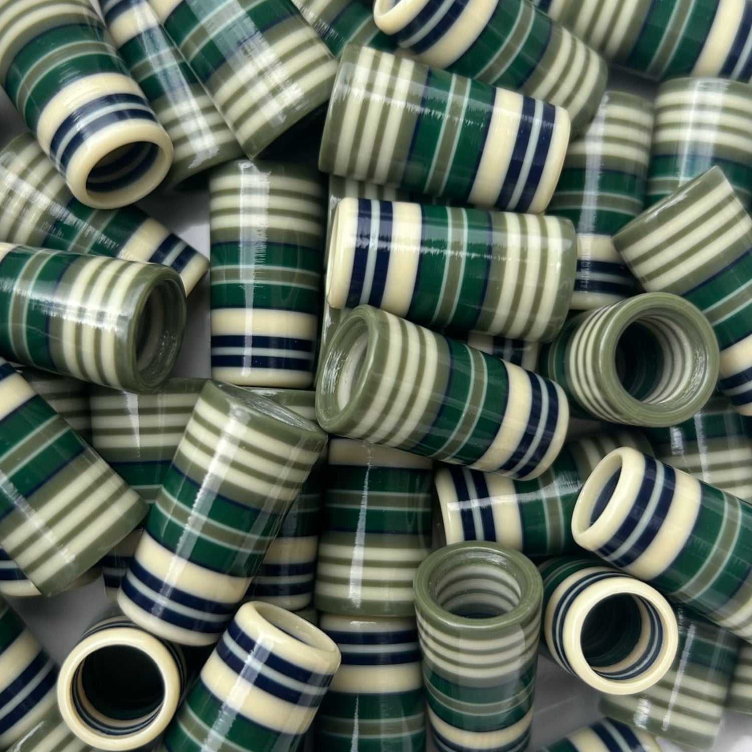 striped navy, cream, and green golf ferrules