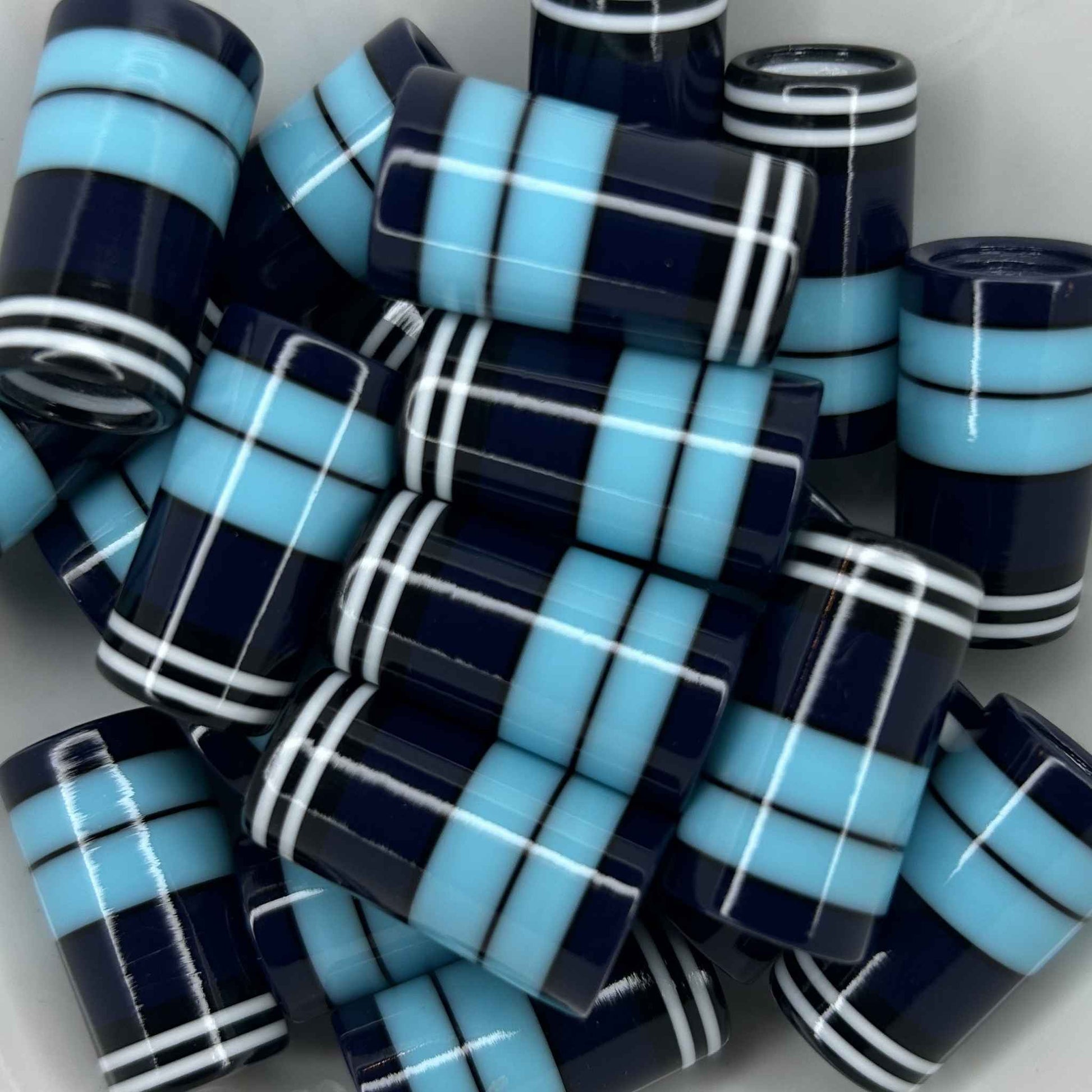 black, white, navy, and light blue golf ferrules