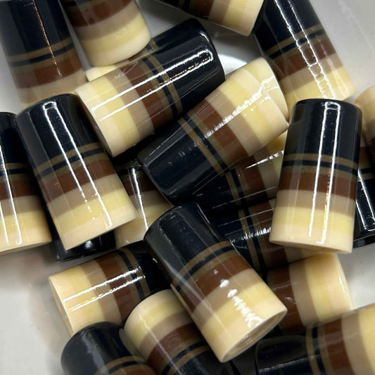 black, brown, and cream golf ferrules