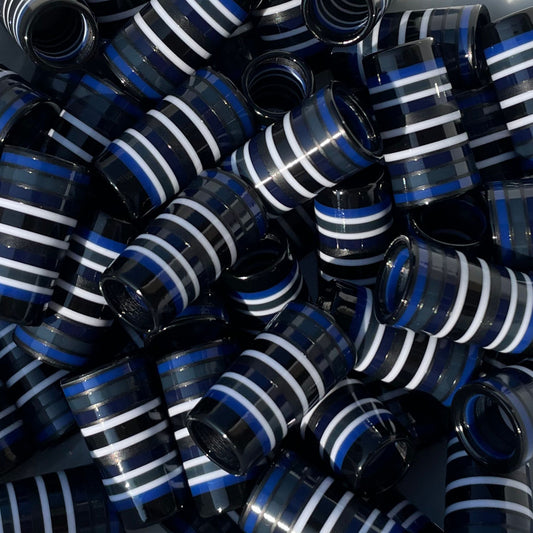 Stack of black and white striped custom golf ferrules