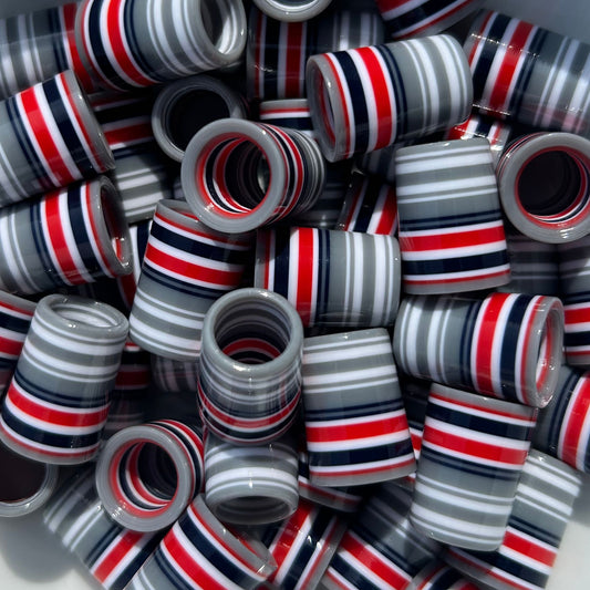 gray, red, white, and blue golf ferrules