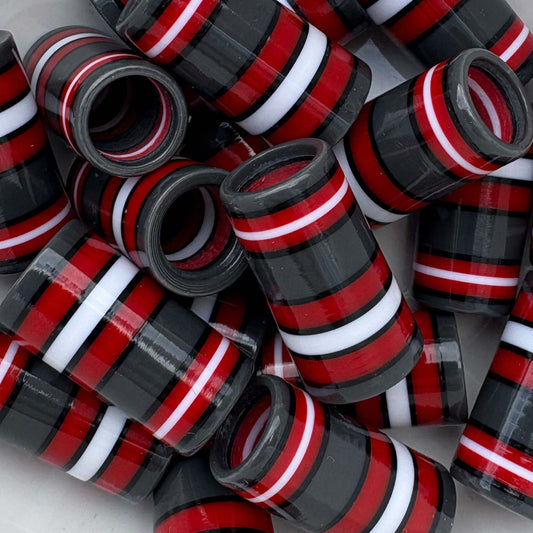 dark gray, white, black, and red golf ferrules