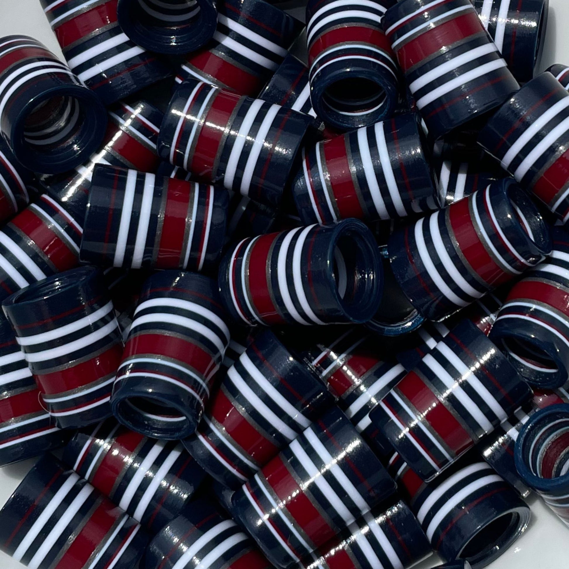 red white and blue ferrules with navy base, red and white stripes, and silver accents