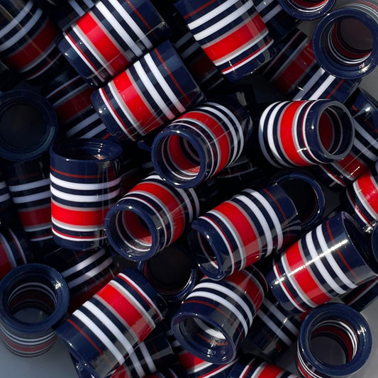 Stack of red, white, and blue striped custom golf ferrules