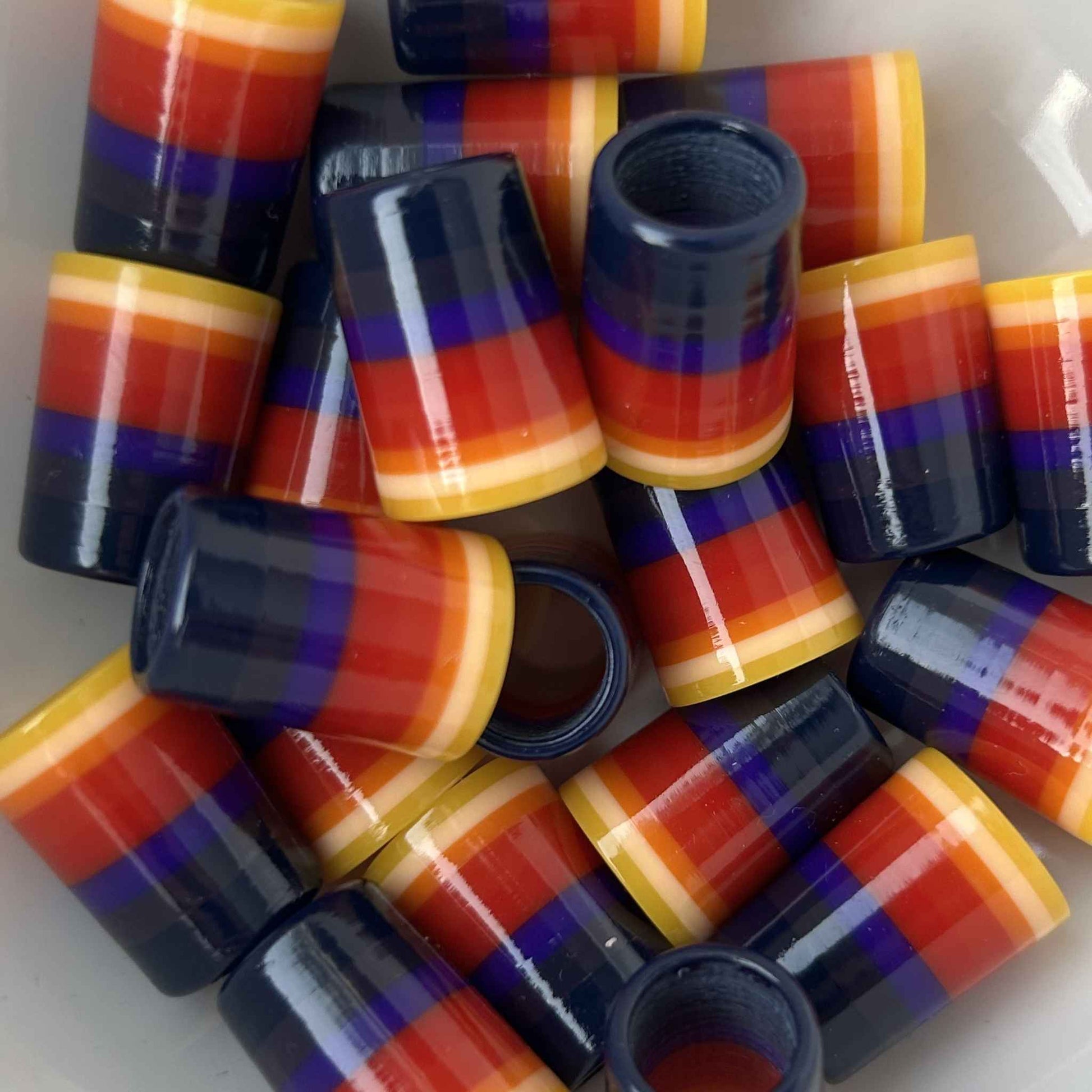 yellow, orange, red, purple, and navy blue custom golf ferrules