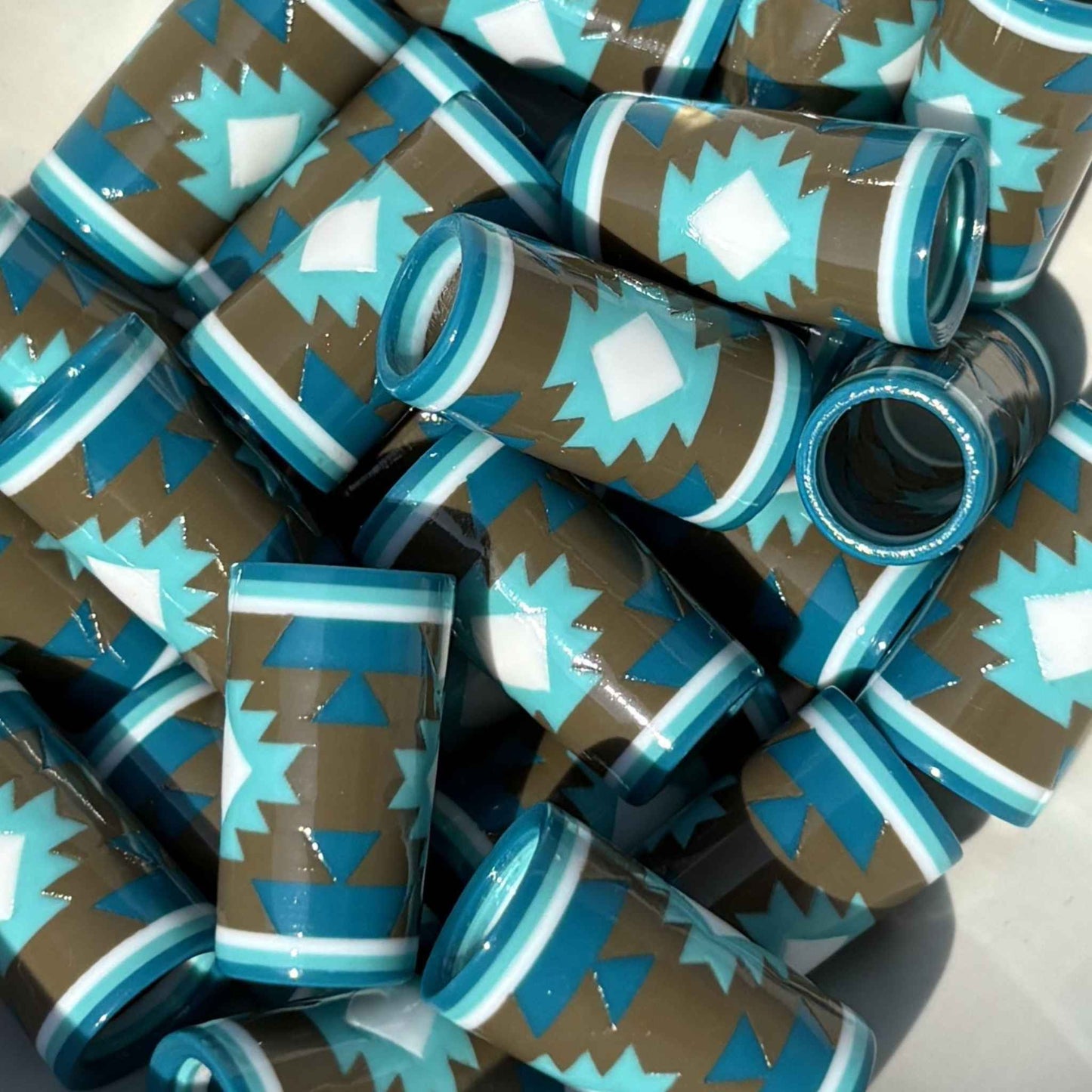 geometric patterned 3d-printed golf ferrules in brown and shades of blue