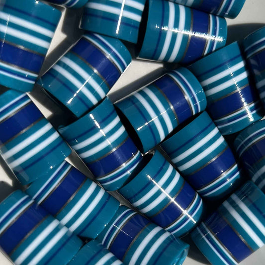 teal, blue, white, and silver shorty golf ferrules
