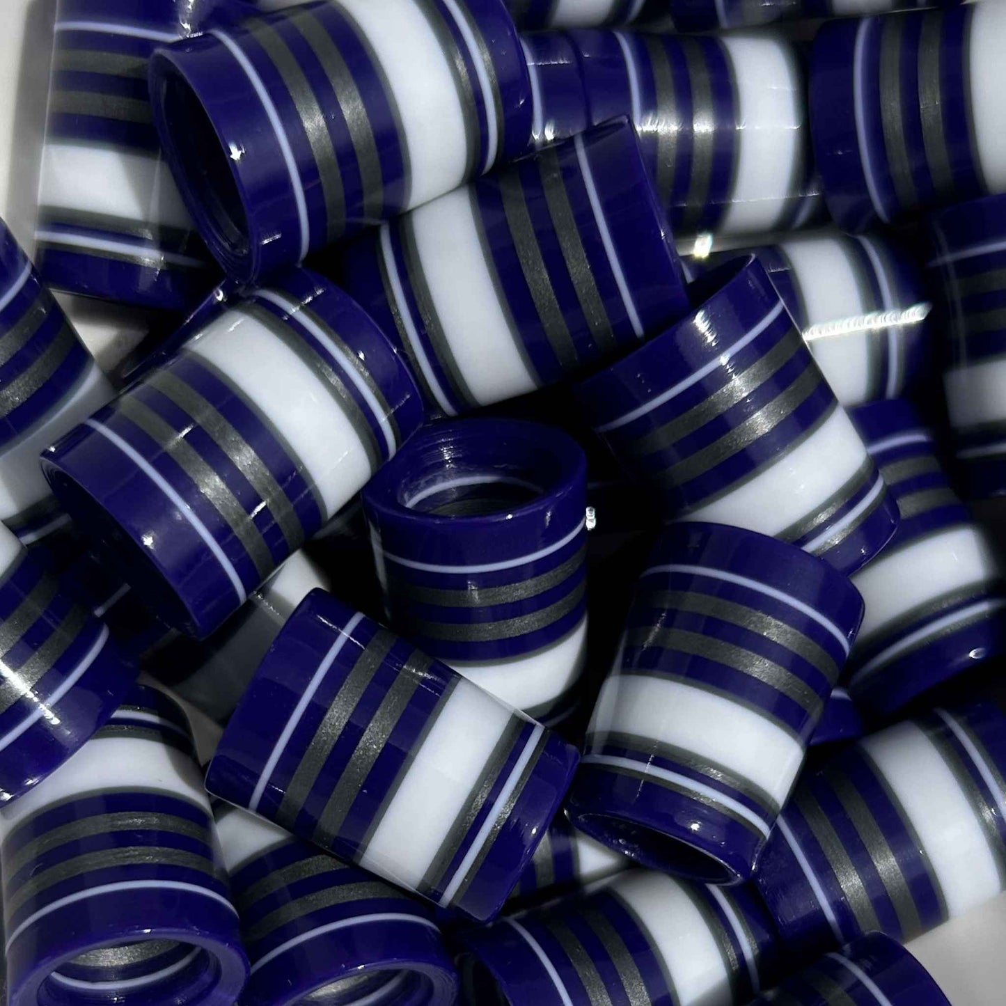 purple, white, and silver golf ferrules