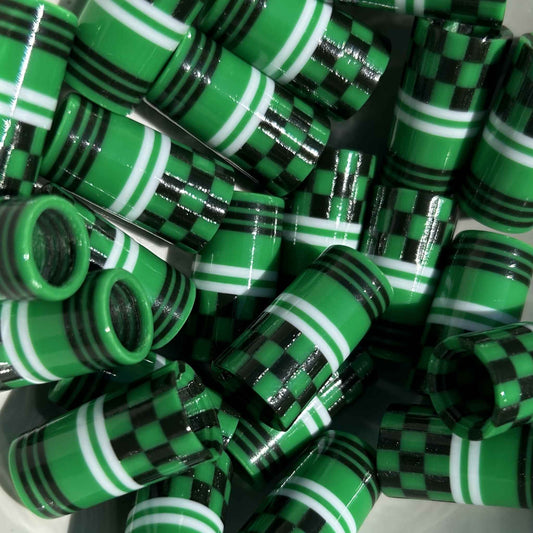 green, black, and white 3D-printed golf ferrules in a checkered pattern