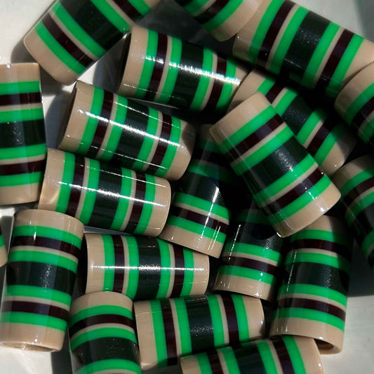 beige, brown, and green golf ferrules.