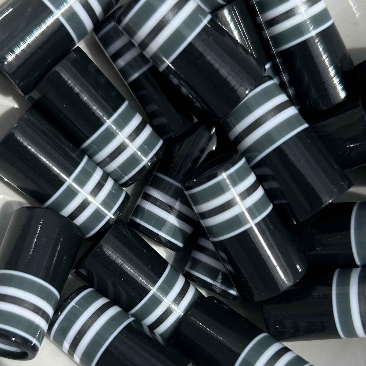 Black, white, gray, and silver striped 1" golf ferrules.