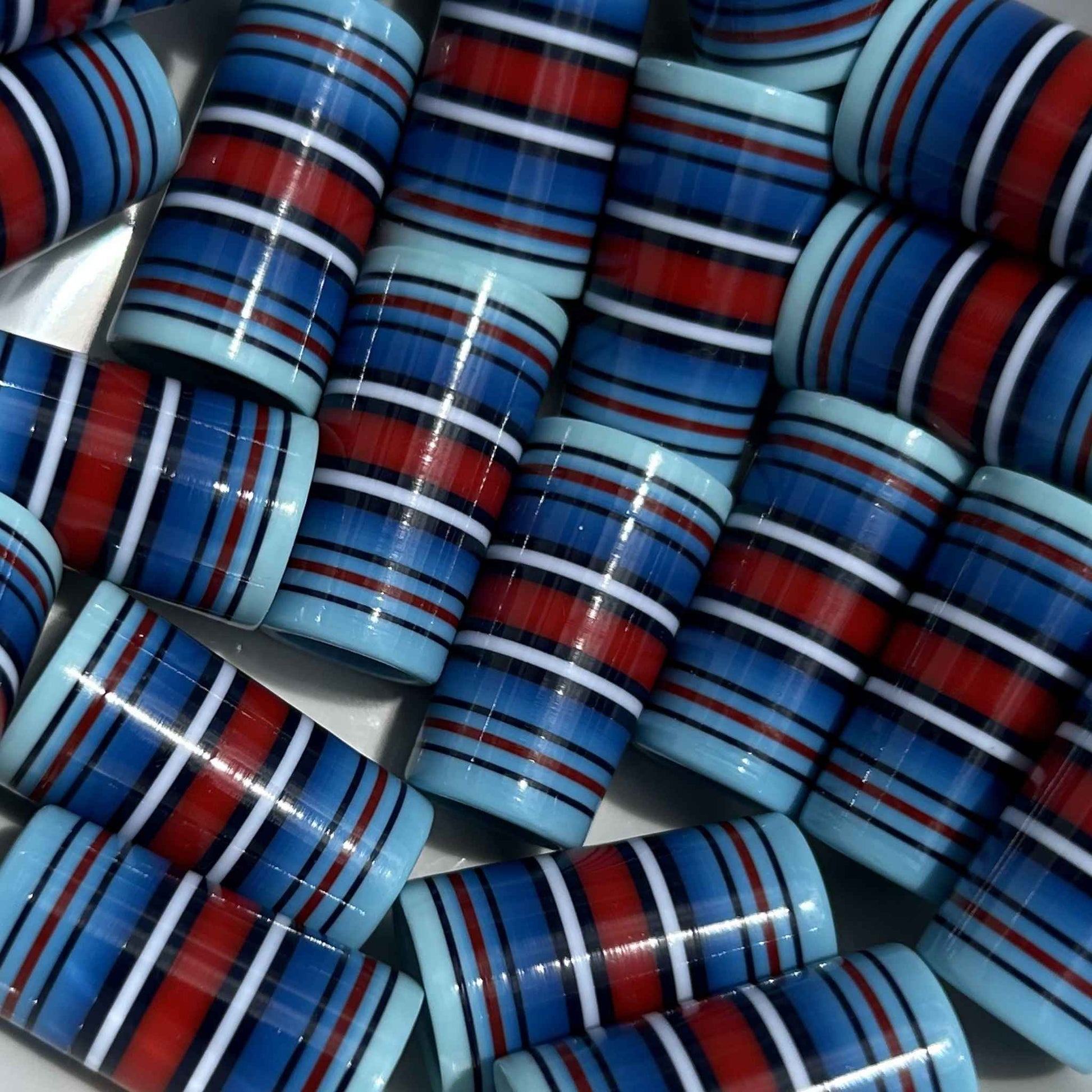 Red, white, and blue ombré golf ferrules with thin black stripes.