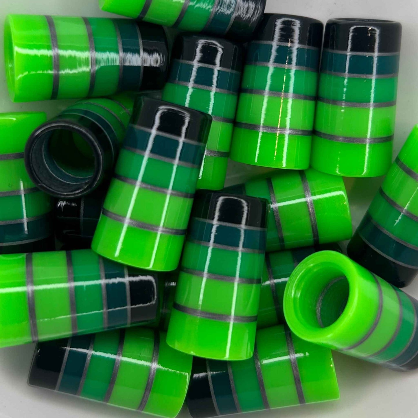pile of green ombre golf ferrules