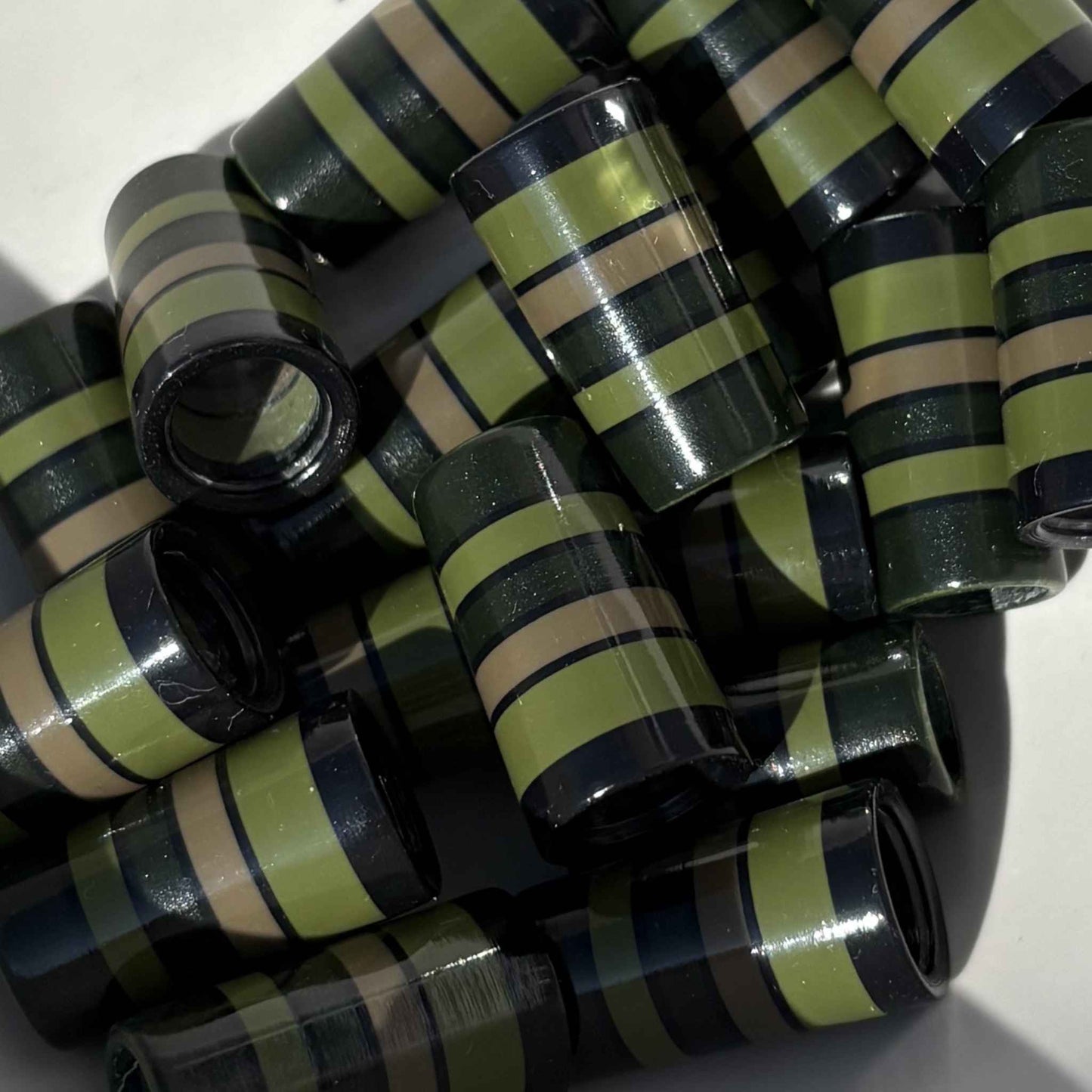 green and beige golf ferrules