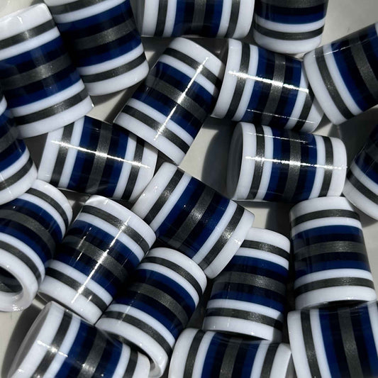 White golf ferrules with navy, black, and silver stripes.