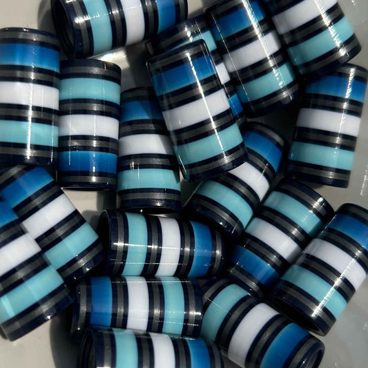 Blue ombre 3D-printed golf ferrules separated by navy and silver stripes with white in the middle.