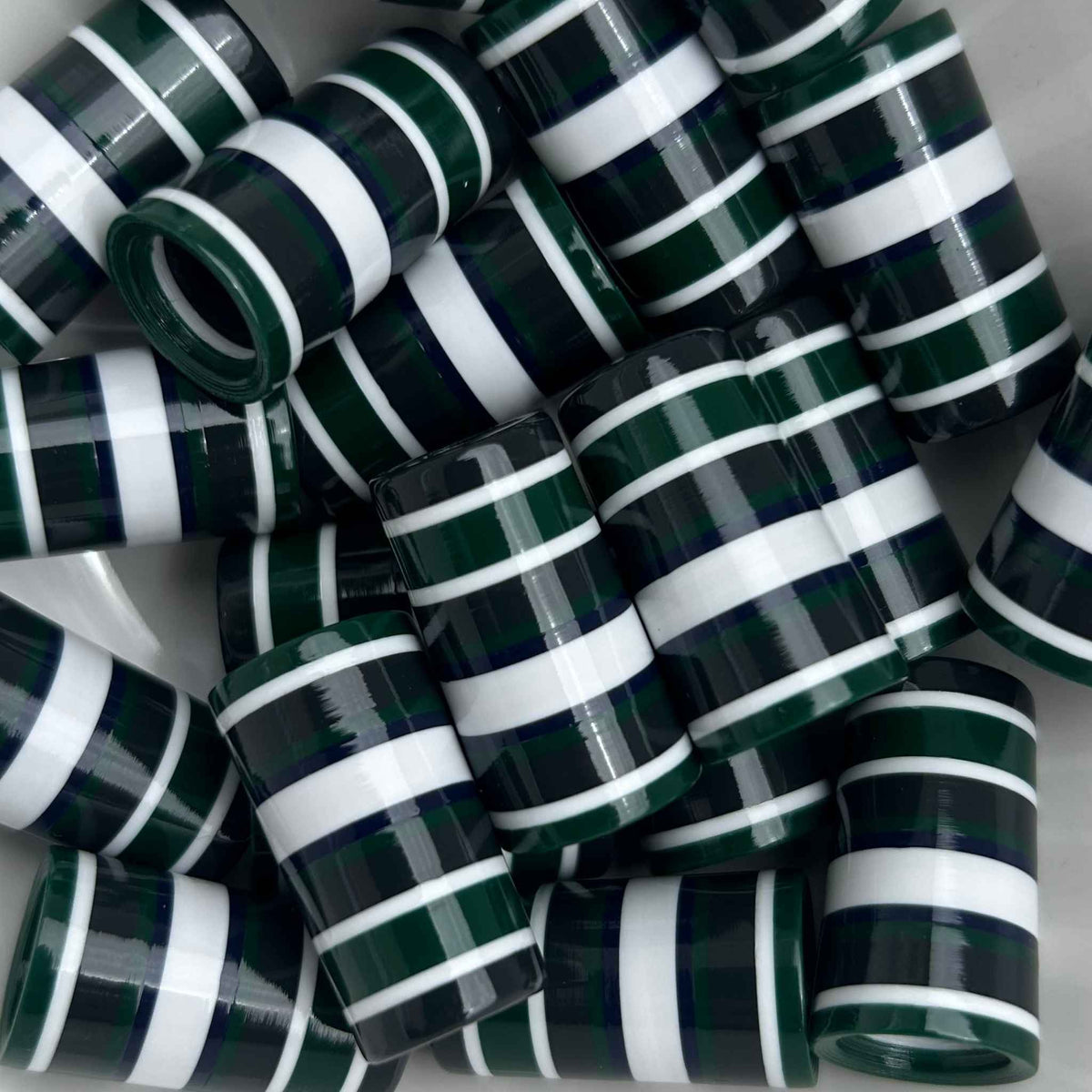 Green and white golf ferrules with navy blue and gray accent stripes.