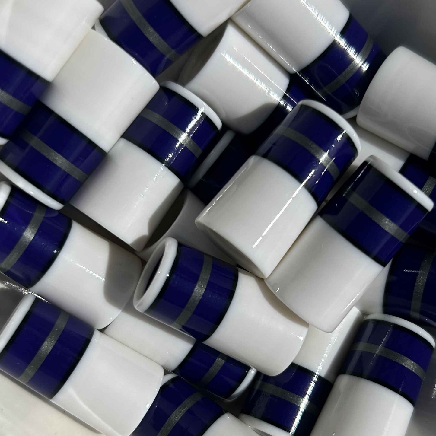 white golf ferrules with purple, silver, and black accents