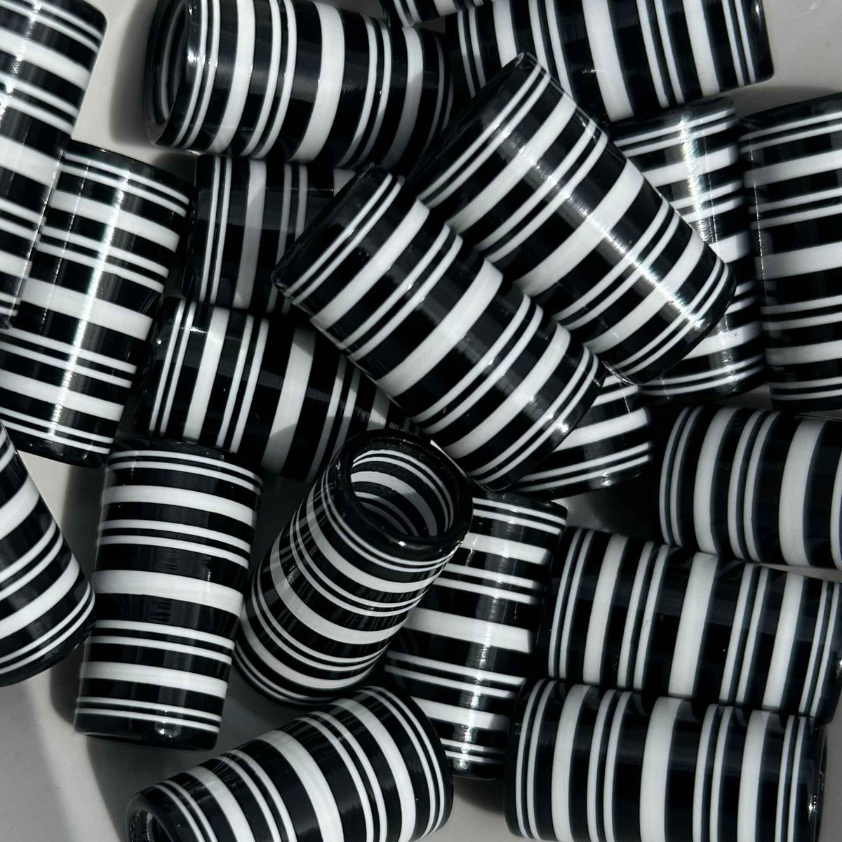 Black and white 1" 3D-printed golf ferrules.