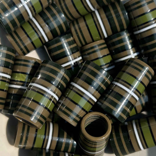 brown, green, and white striped golf ferrules