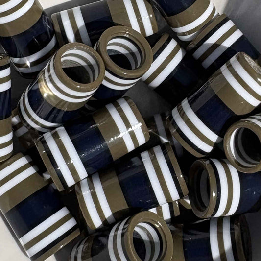 beige, white, and navy blue golf ferrules