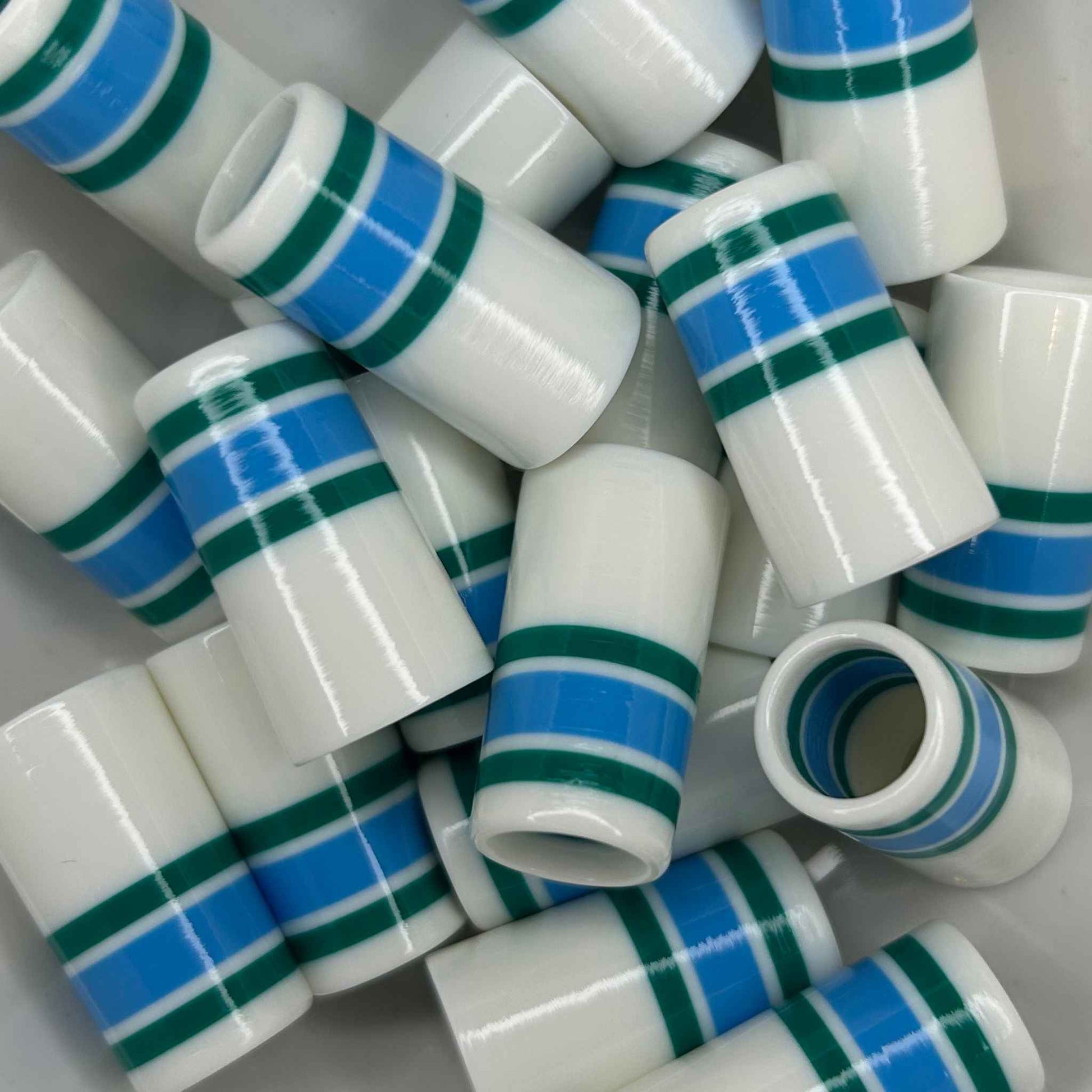 white, blue, and green golf ferrules with a minimal look