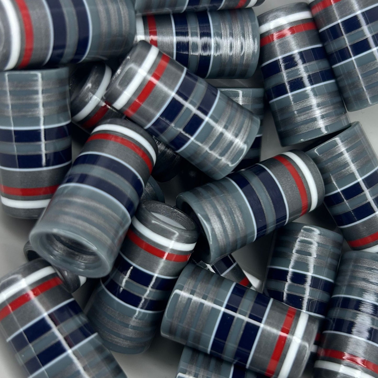 red, white, blue, and silver golf ferrules