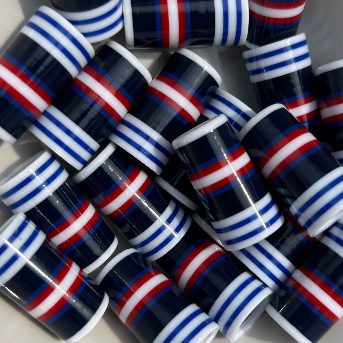red, white, and blue striped golf ferrules with various shades of blue.