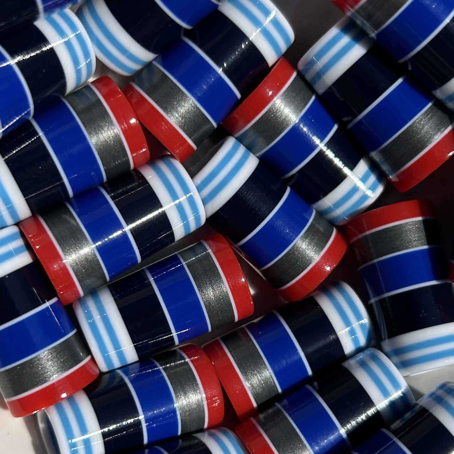 red, white, and blue golf ferrules with silver and black accent stripes