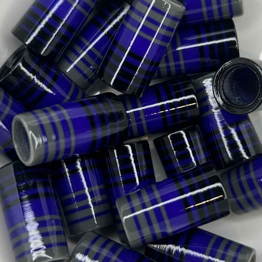 pile of black, purple, and gray golf ferrules